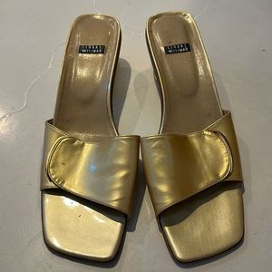 Stuart Weitzman gold sandals